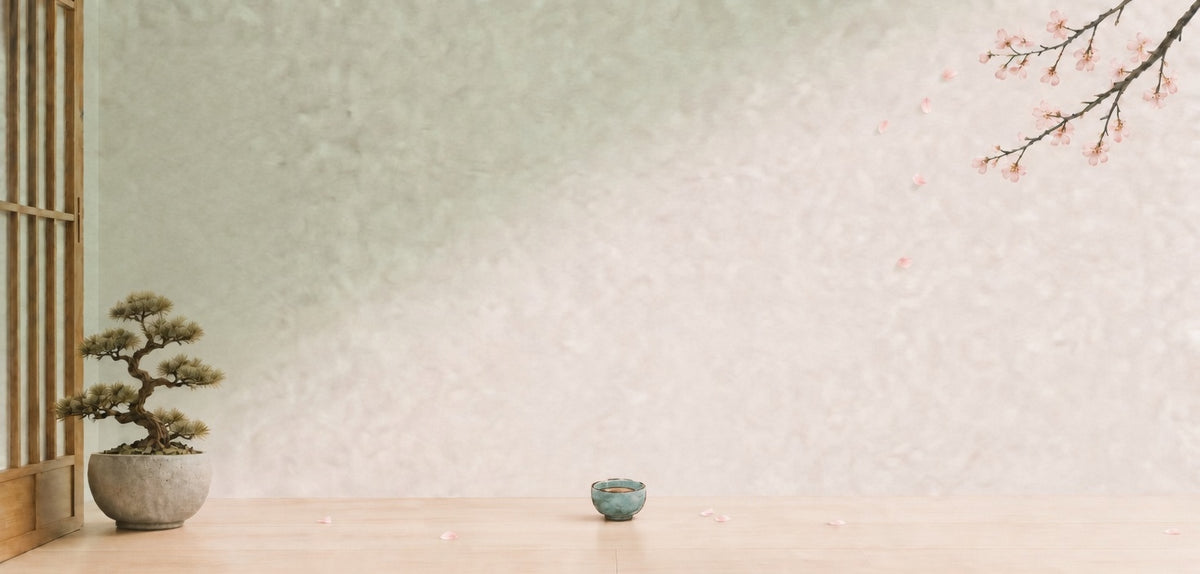 An empty, quiet room with a single tea bowl and fallen petals.